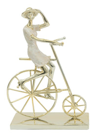 Gold Woman on Bicycle