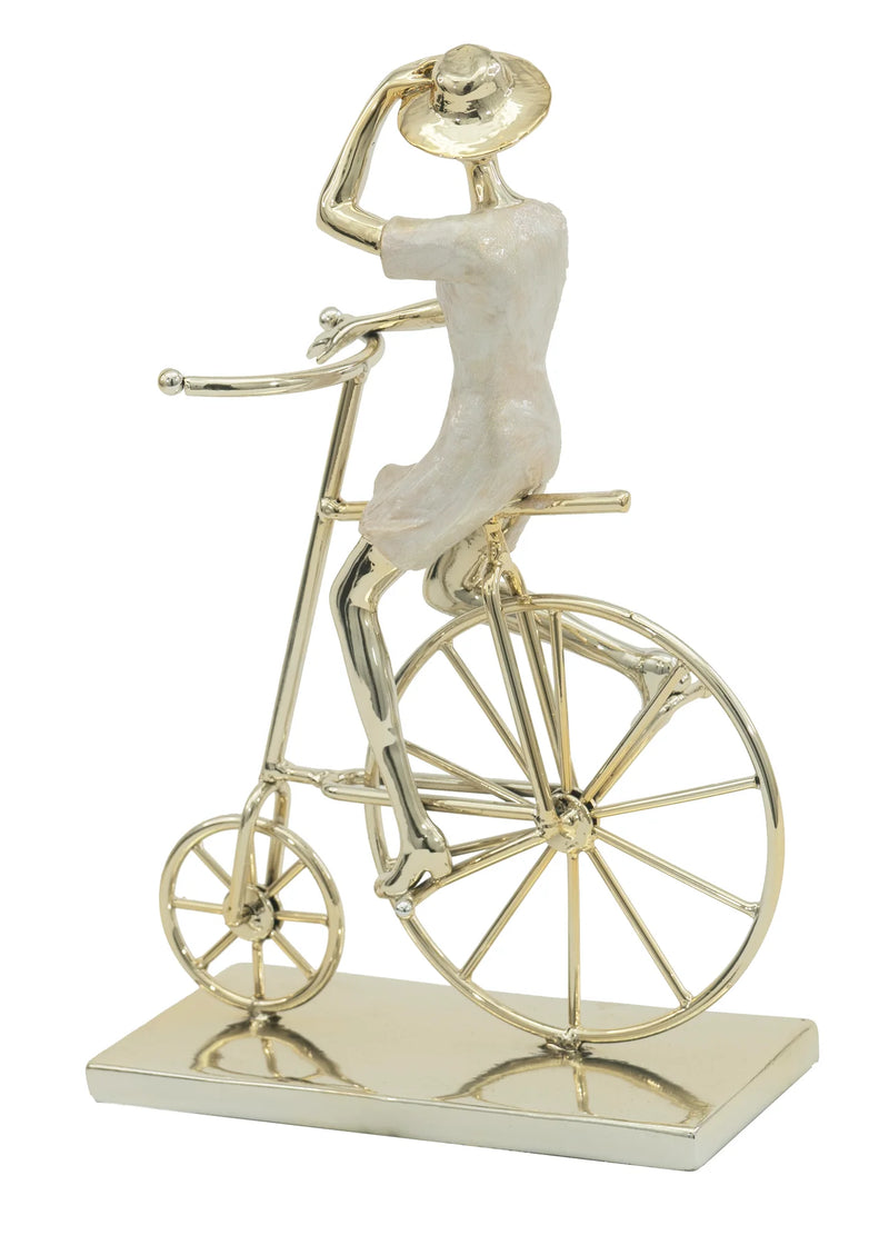 Gold Woman on Bicycle